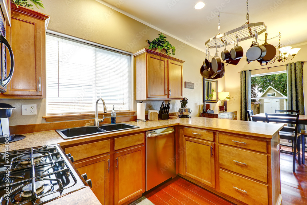 Fototapeta premium Kitchen room wtih hanging pot rack