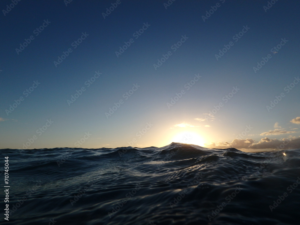 Dramatic lighting the sky and ocean during sunsets with light re Dramatic lighting the sky and ocean during sunsets with light re