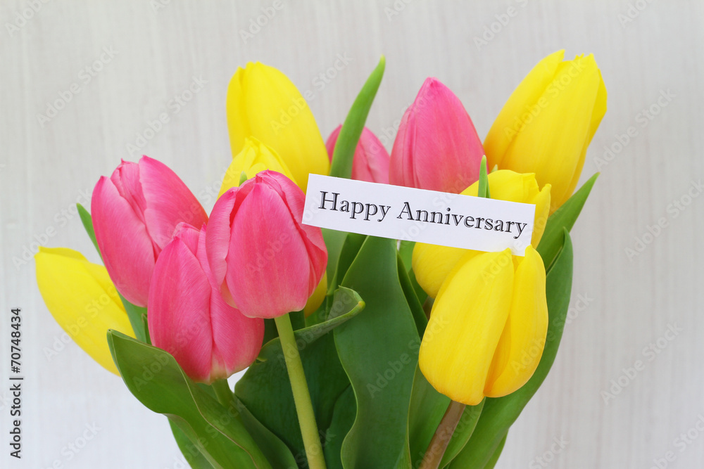 Happy Anniversary card with colorful tulips Stock Photo | Adobe Stock