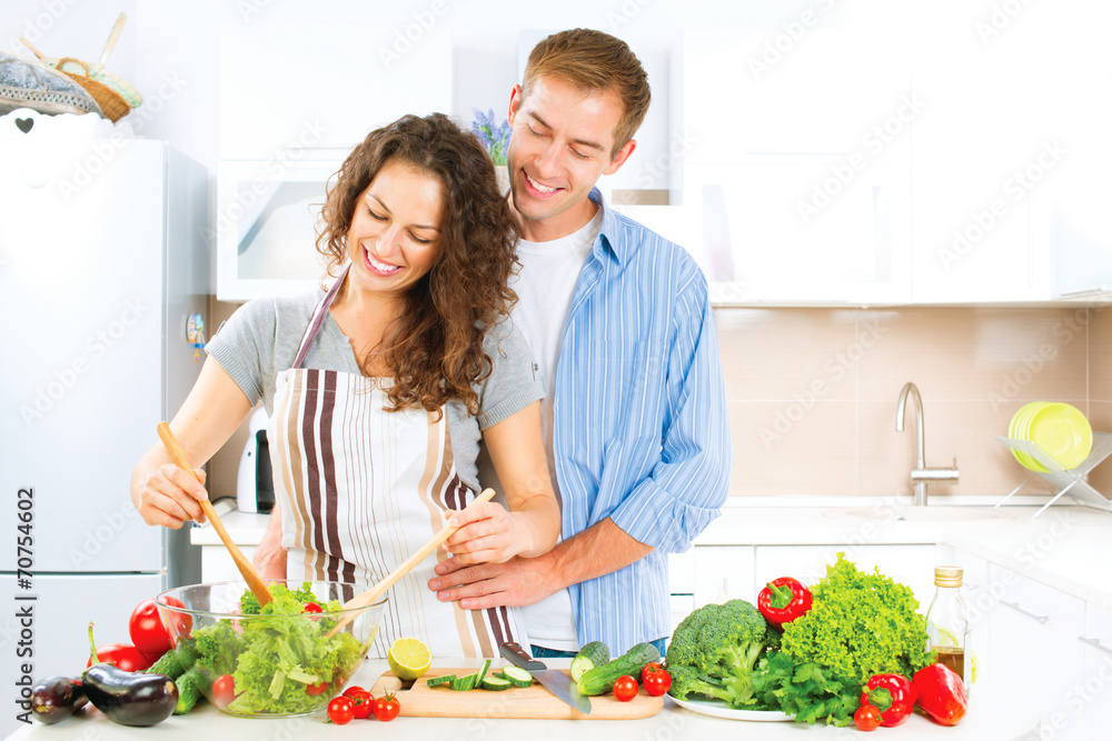 Happy Couple Cooking Together. Vegetable Salad. Dieting