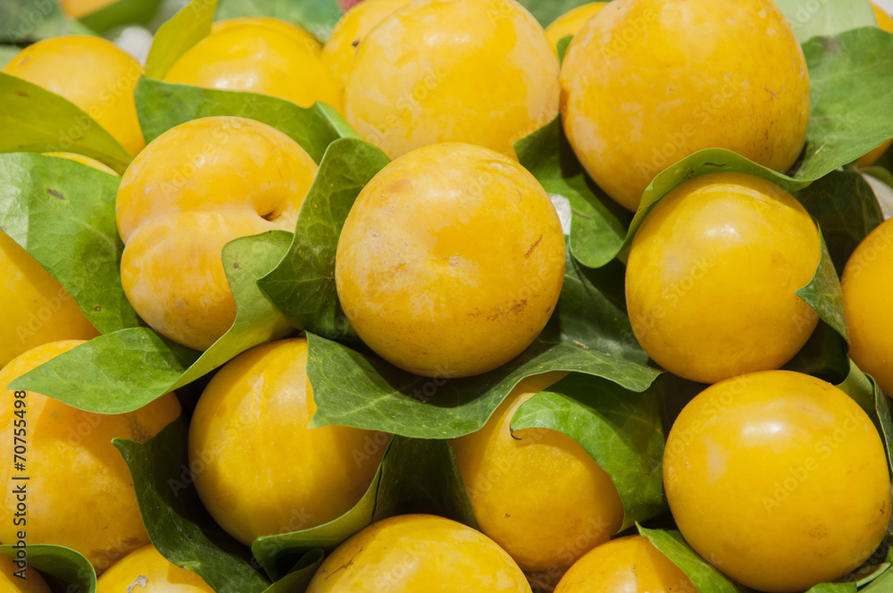 pile of yellow plums