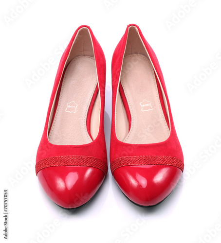 Womens red shoes on a white background