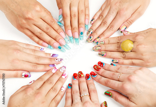 Female hands with various nail arts