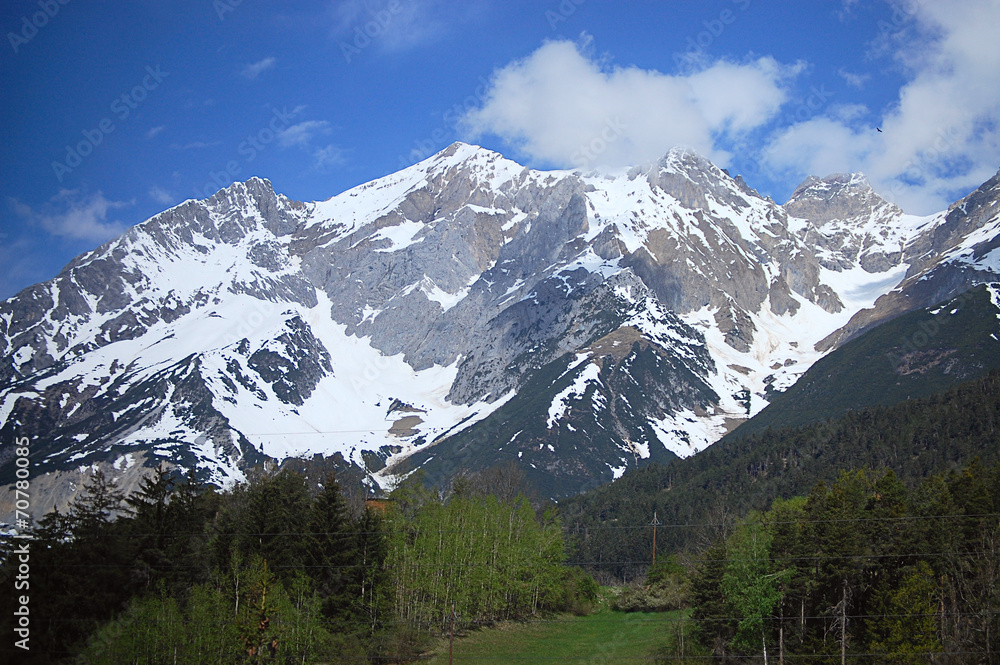 Snow-capped mountains against the sky Snow-capped mountains against the sky
