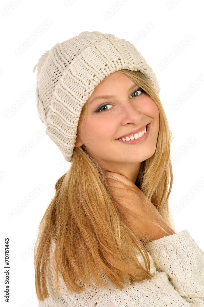 Young attractive girl with woolen hat in the studio . Young attractive girl with woolen hat in the studio .