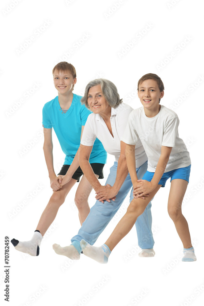 Grandmother exercising with two boys