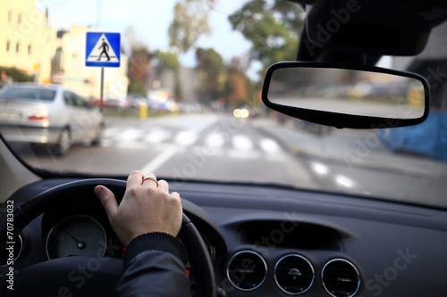 A driver approaching a pedestrian crossing