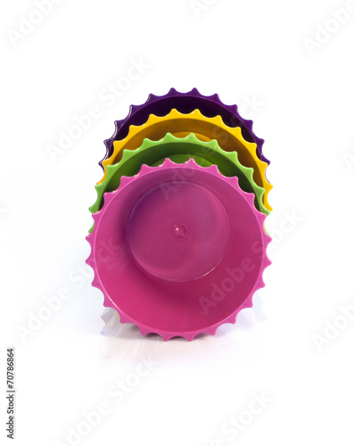 Four colorful cups on white background