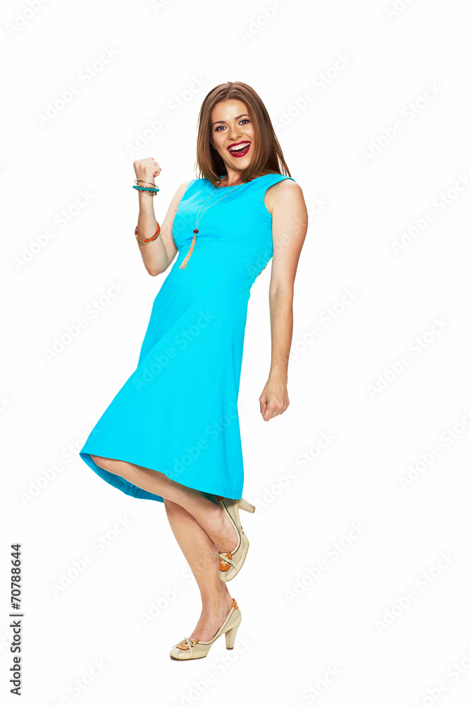 happy woman in blue dress posing against white happy woman in blue dress posing against white