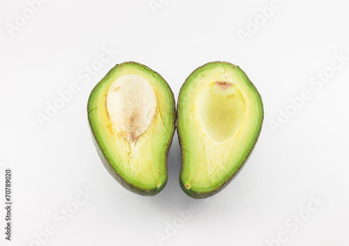 Fresh avocado fruit on white background