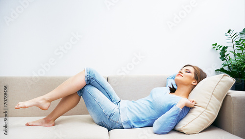 Woman relaxing at home.