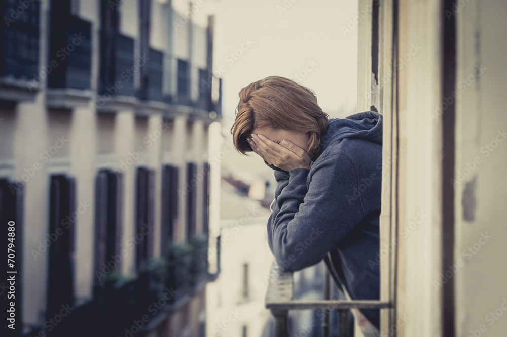 young woman suffering depression and stress at home balcony young woman suffering depression and stress at home balcony