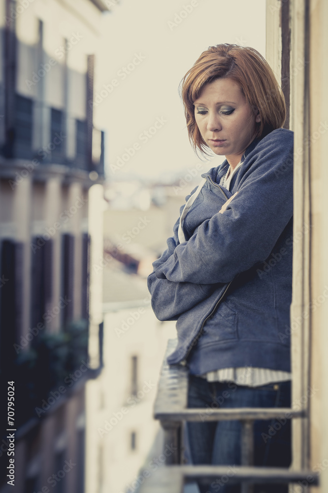 young woman suffering depression and stress at home terrace young woman suffering depression and stress at home terrace