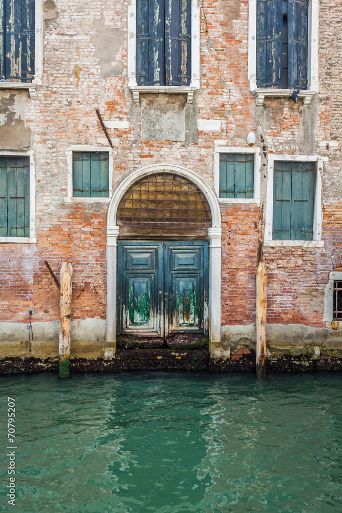 Buildings with traditional Venetian windows in Venice, Italy