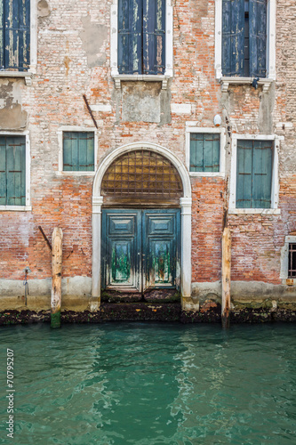 Buildings with traditional Venetian windows in Venice, Italy