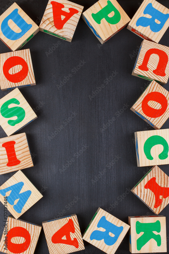 Dark background with alphabet blocks Dark background with alphabet blocks