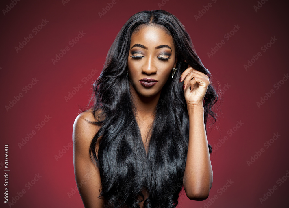 Black woman with long luxurious shiny hair Black woman with long luxurious shiny hair