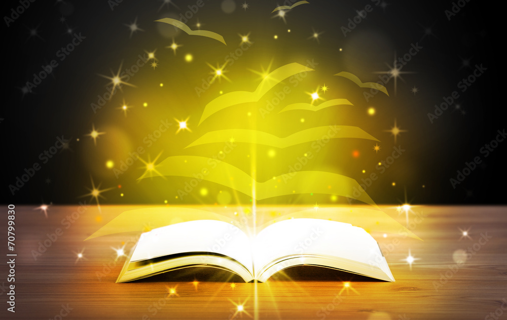 Open book with golden glow flying paper pages Open book with golden glow flying paper pages
