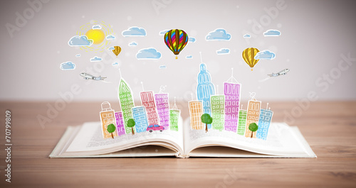 cityscape drawing on open book