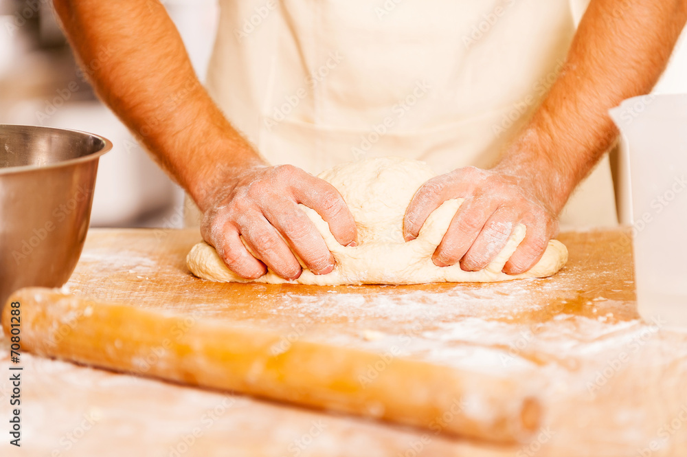 Man kneading the dough. Man kneading the dough.