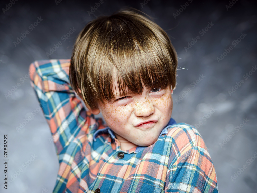 Emotional portrait of red-haired boy Emotional portrait of red-haired boy