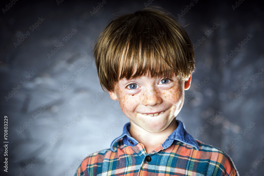 Emotional portrait of red-haired boy Emotional portrait of red-haired boy