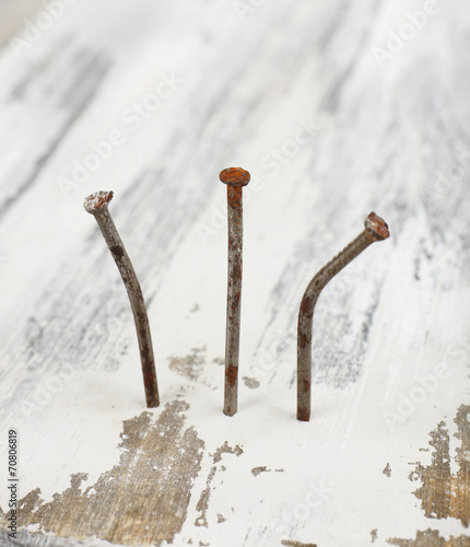 Nails in wooden board close-up