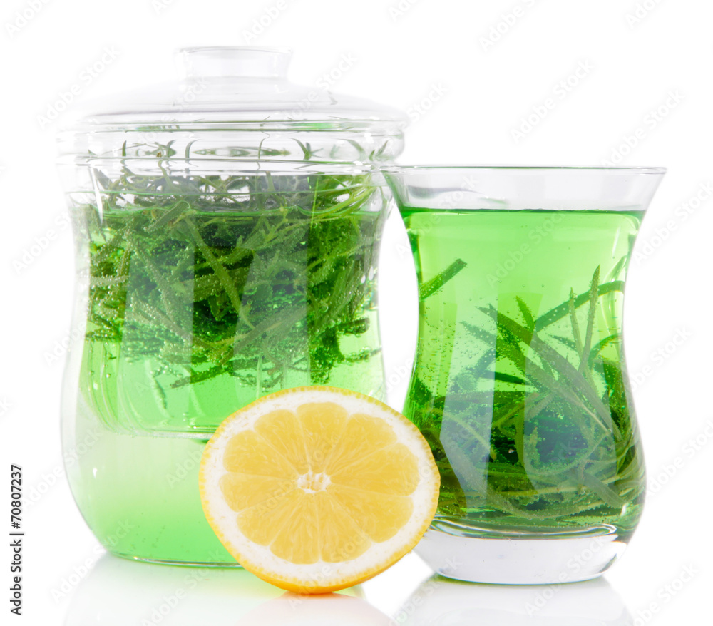 Estragon drink with lemon isolated on white Estragon drink with lemon isolated on white