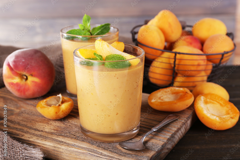 Apricot dessert in glasses on table close-up Apricot dessert in glasses on table close-up