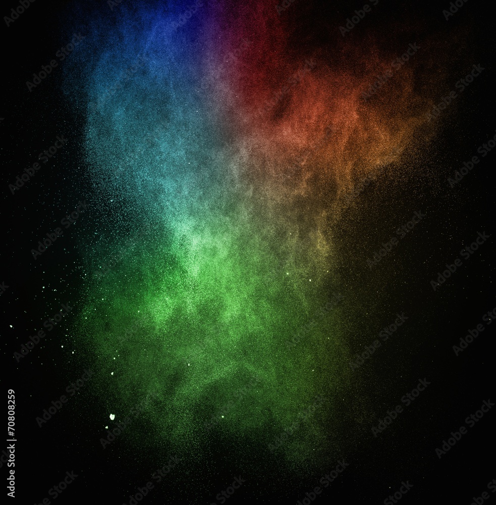 Obraz premium Colourful powder exploding isolated on black
