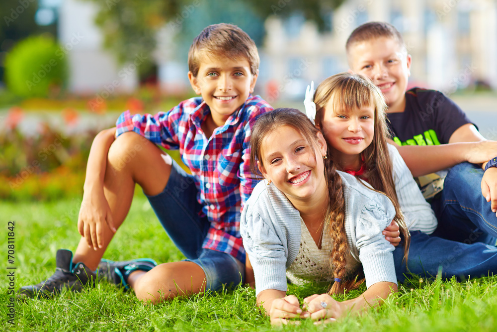 Fototapeta premium happy schoolkids playing in the park