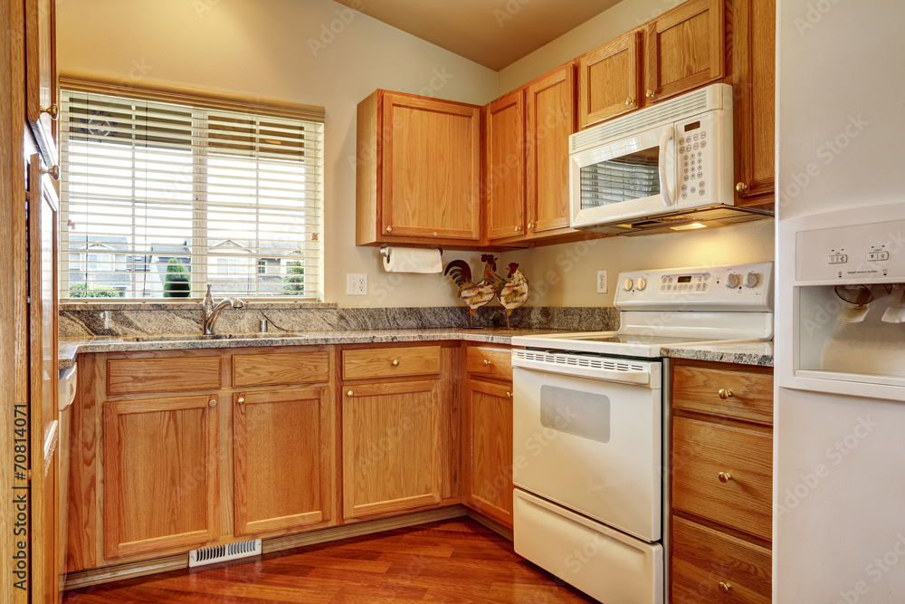 Small kitchen area with white appliances Small kitchen area with white appliances