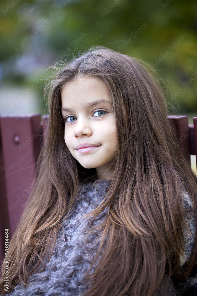 Beautifal little girl in the autumn park Beautifal little girl in the autumn park