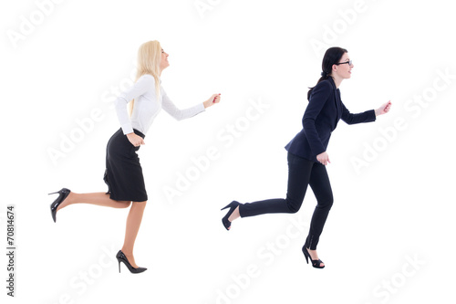 two running business women in business suit isolated on white