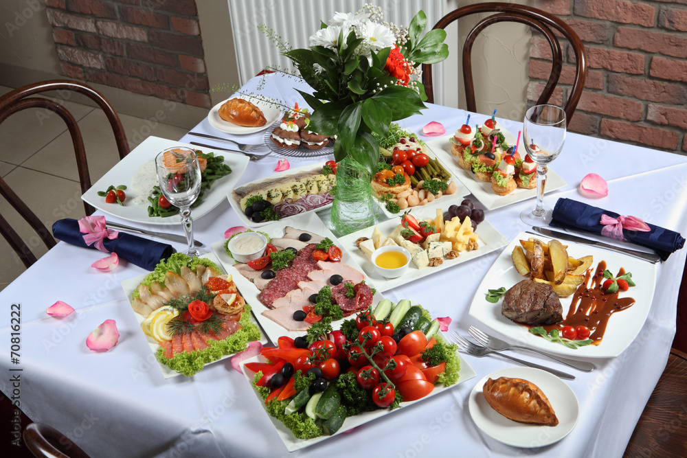 A table set with a variety of dishes