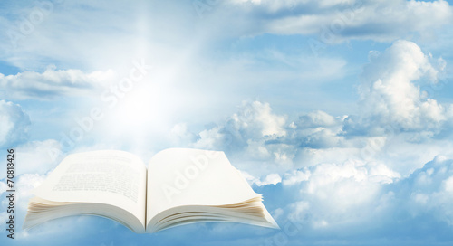 Open book in heavenly sky © Stillfx