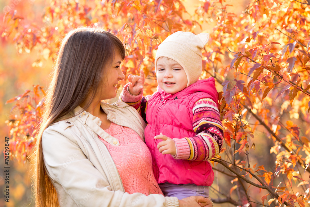 beautiful mother with kid girl outdoors in fall beautiful mother with kid girl outdoors in fall