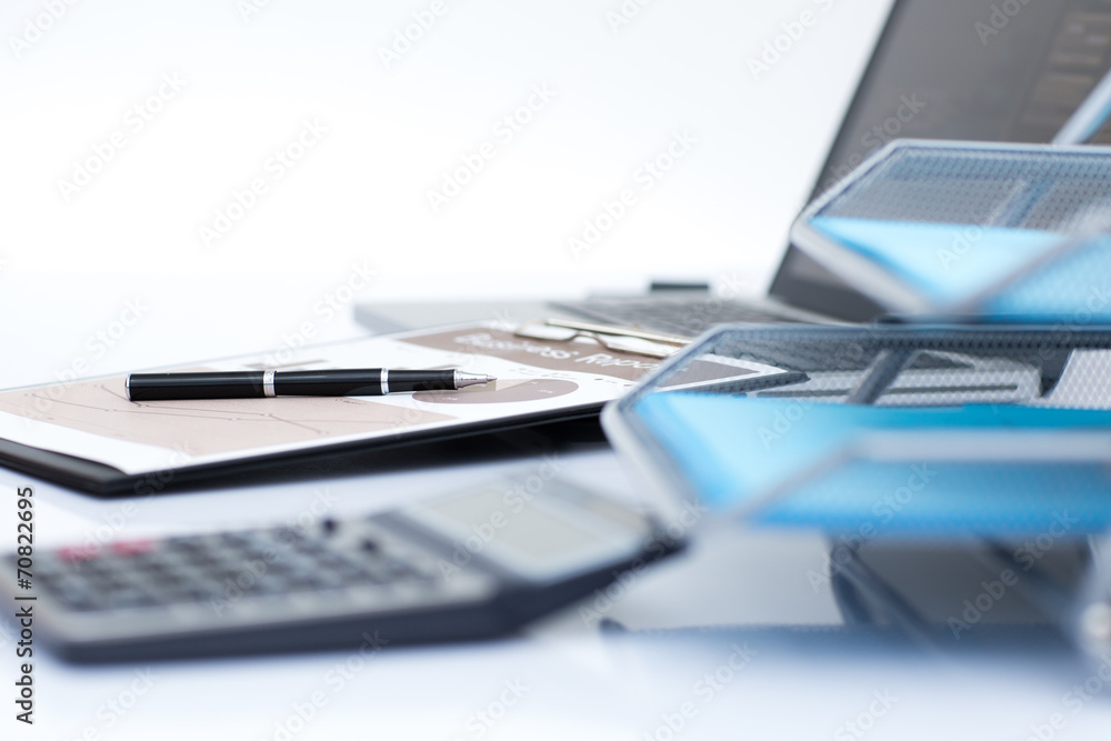 Analyzing investment charts with laptop. Accounting Analyzing investment charts with laptop. Accounting