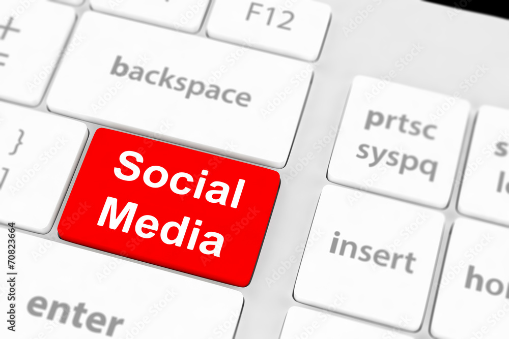 Social media concept on keyboard background
