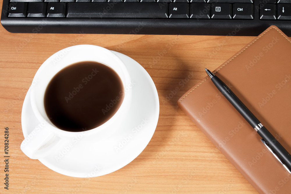 Office desk with coffee cup Office desk with coffee cup