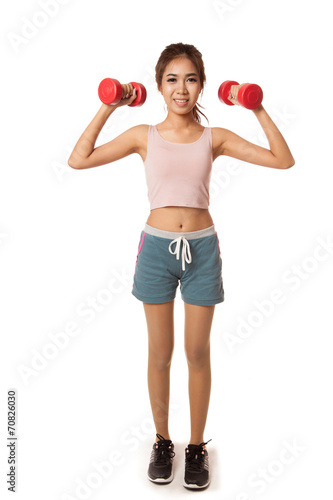 Asian healthy girl workout with dumbbell