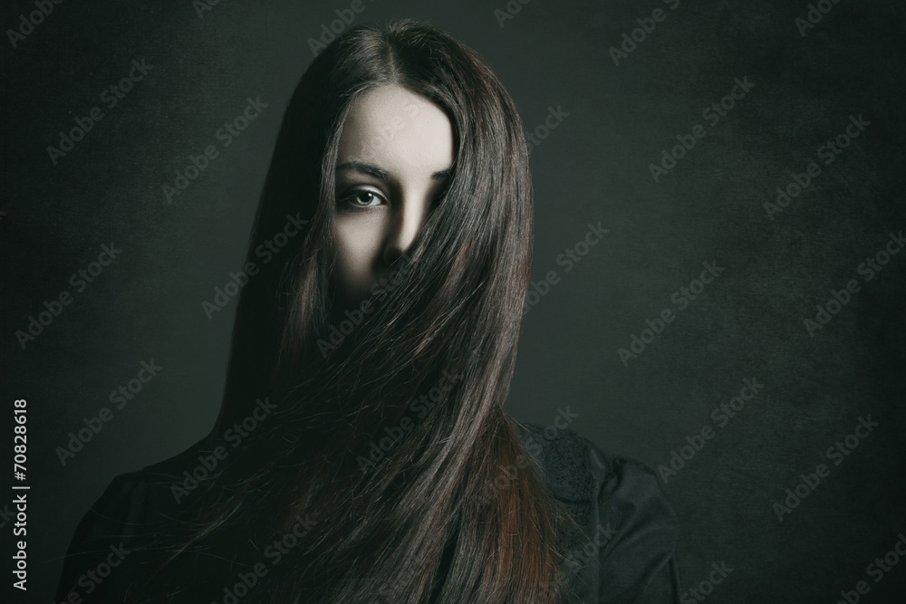 Naklejka premium Studio portrait of young woman