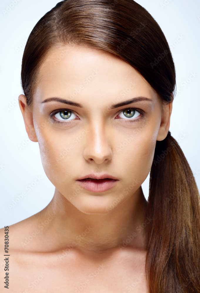 Closeup portrait of a young attractive woman with clean face Closeup portrait of a young attractive woman with clean face