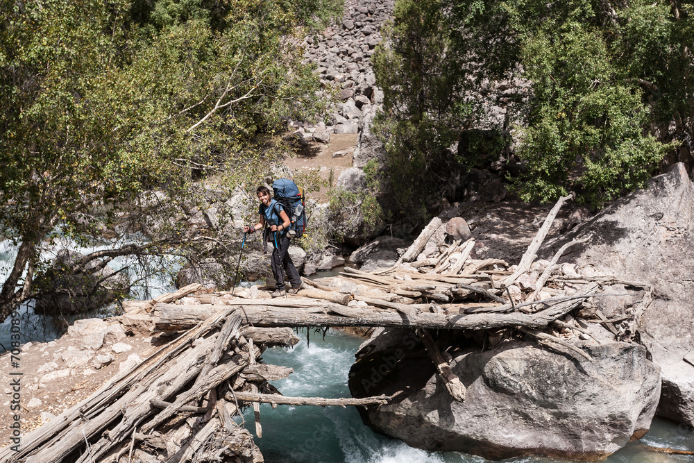 Fototapeta premium Hiker in high mountains.