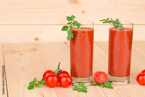 Tomato juice with parsley composition.