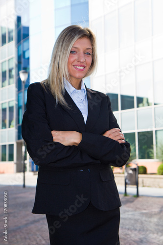 Portrait of a young confident business woman smiling