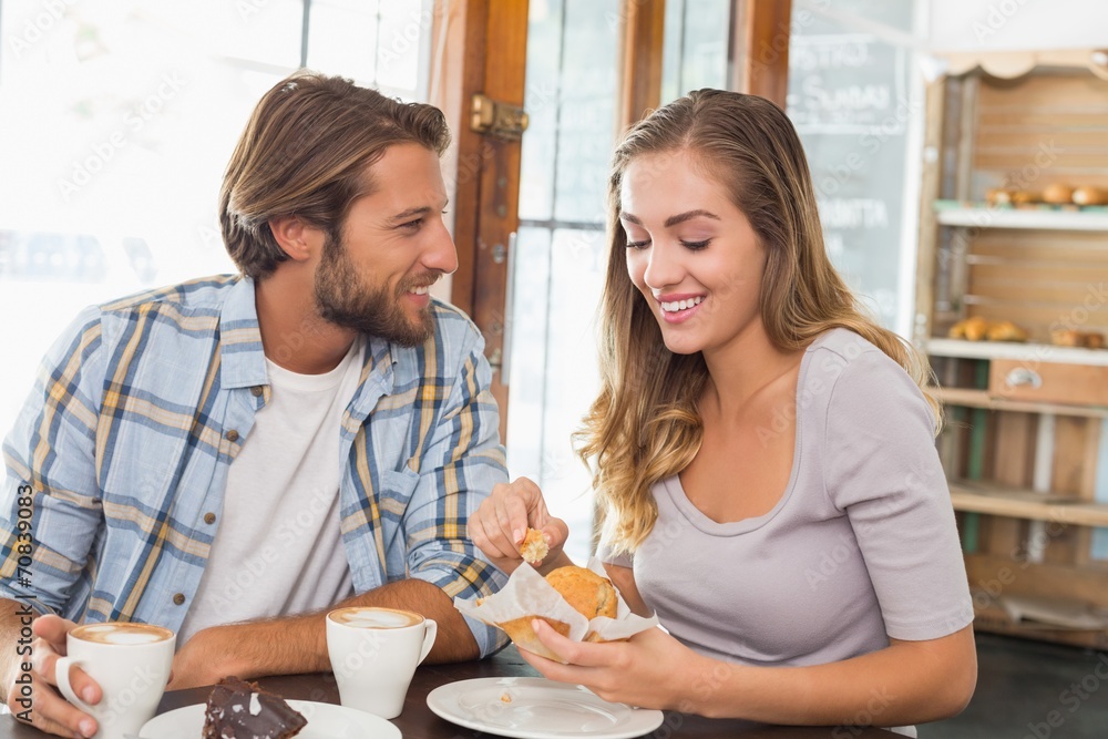Happy couple enjoying coffee and cake Happy couple enjoying coffee and cake