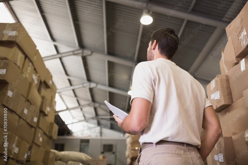 Warehouse worker with clipboard Warehouse worker with clipboard