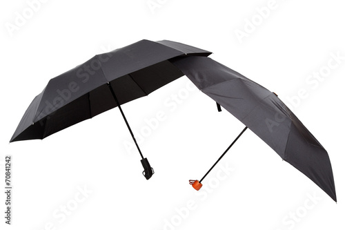 Modern black umbrellas in the unfolded form.