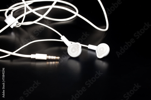 the earphone on black background